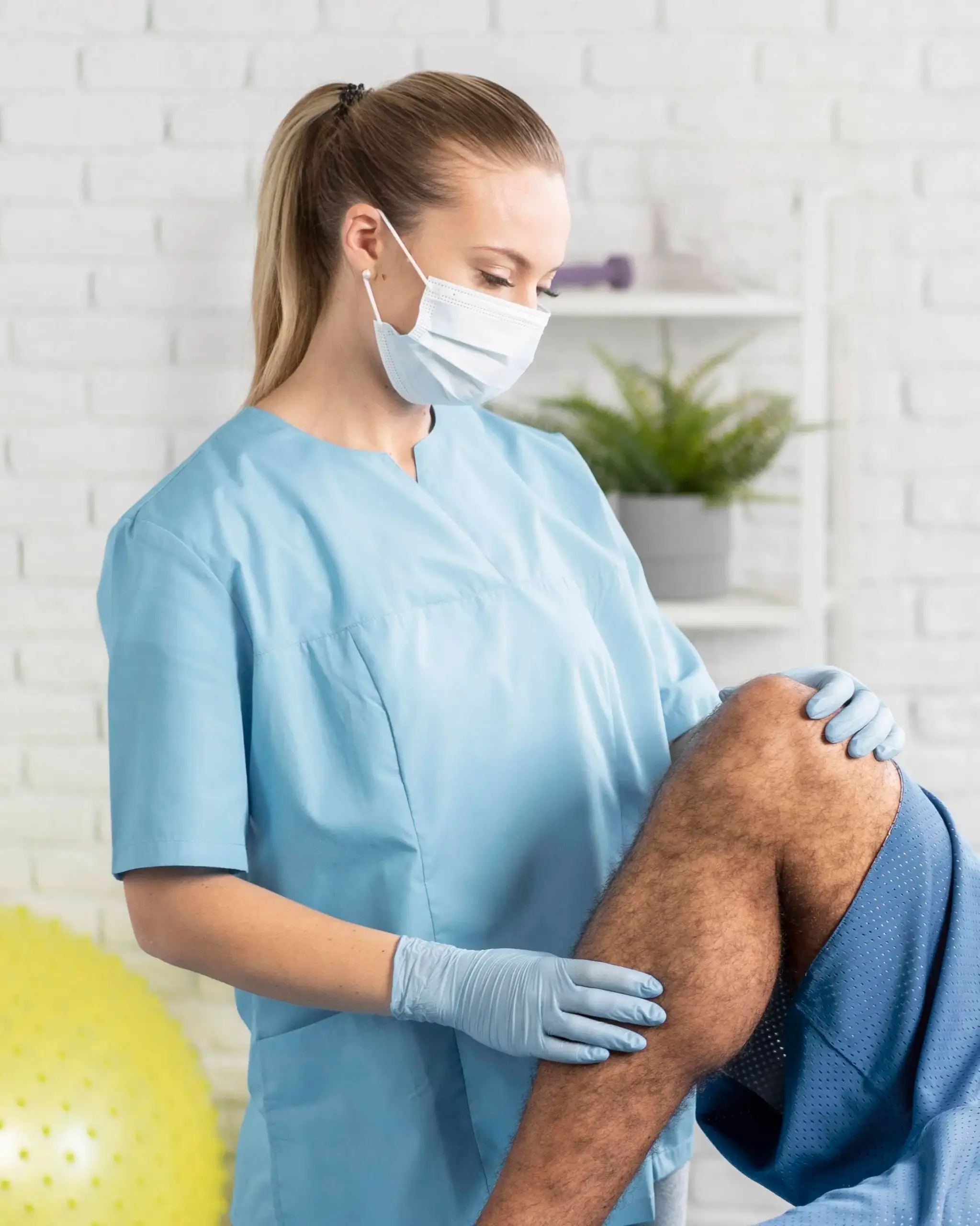 female-physiotherapist-with-male-patient (1)